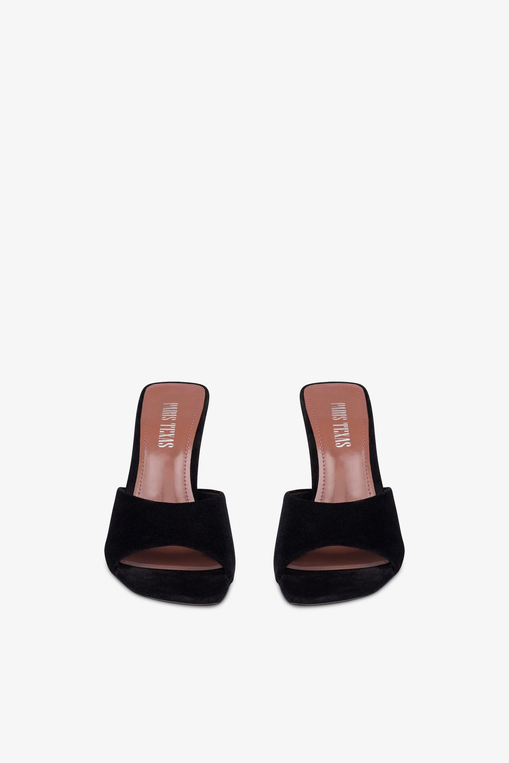 Mules in black suede leather
